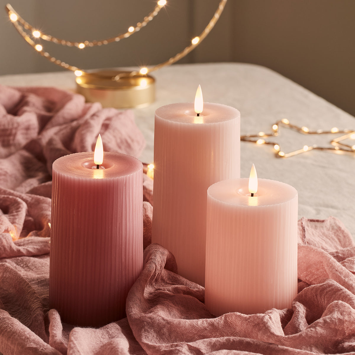 TruGlow® LED Kerzen Echtwach Trio geriffelt rosa