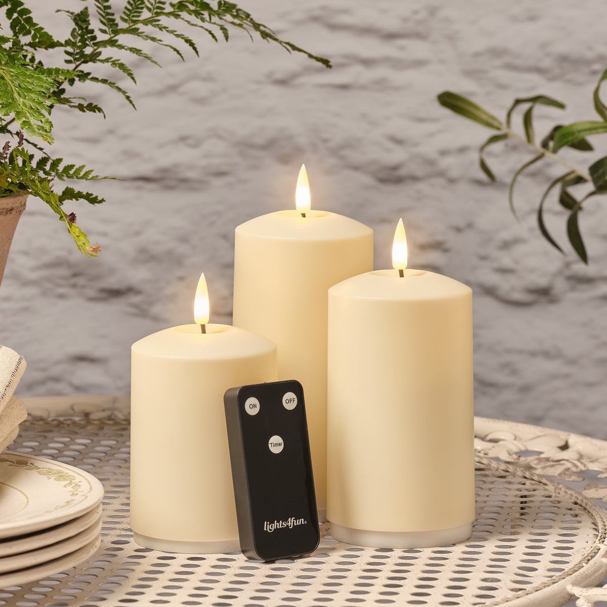 3er Set TruGlow® wiederaufladbare Outdoorkerzen mit Fernbedienung