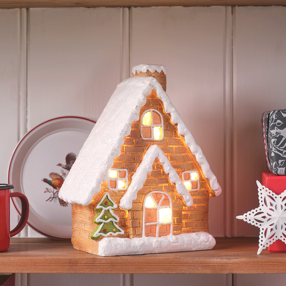 Leuchtende Häuschen & Lichterkette mit Lebkuchenmännchen