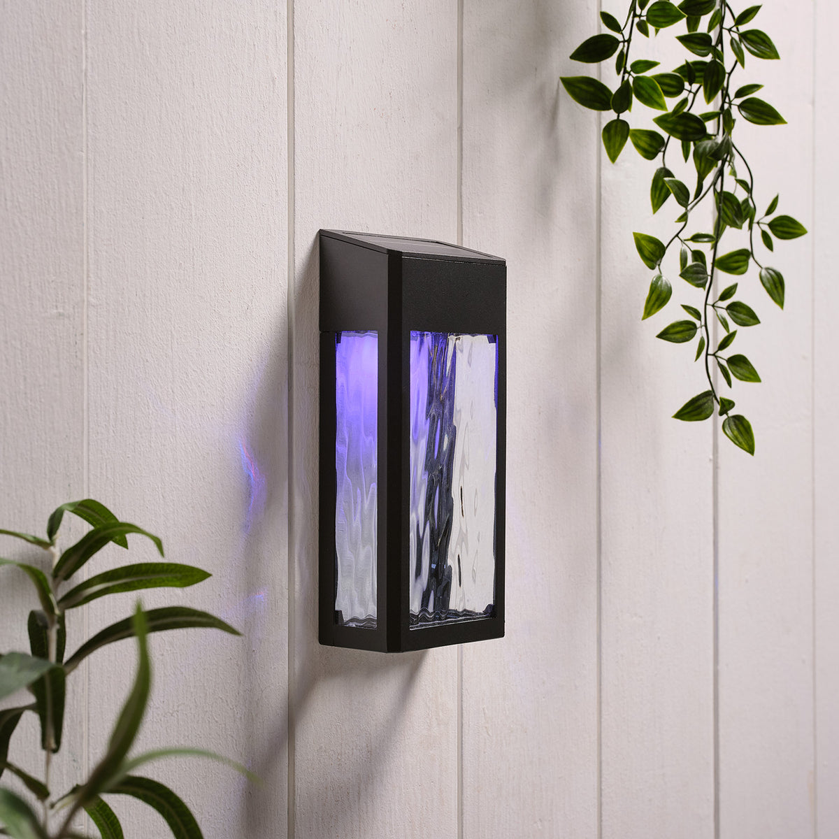 LED Solar Wandleuchte aus Glas schwarz