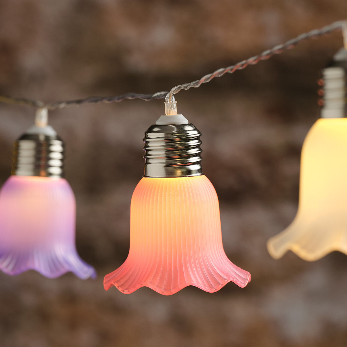 10er LED-Solar-Lichterkette pastellfarbene Blumen in Warmweiß
