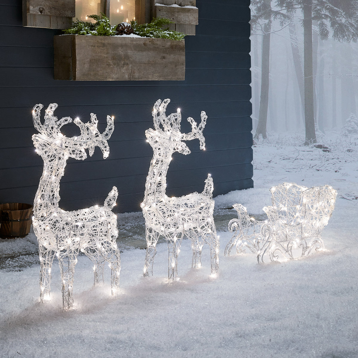 Bicolor Solar-LED-Rentiere mit Schlitten Swinsty