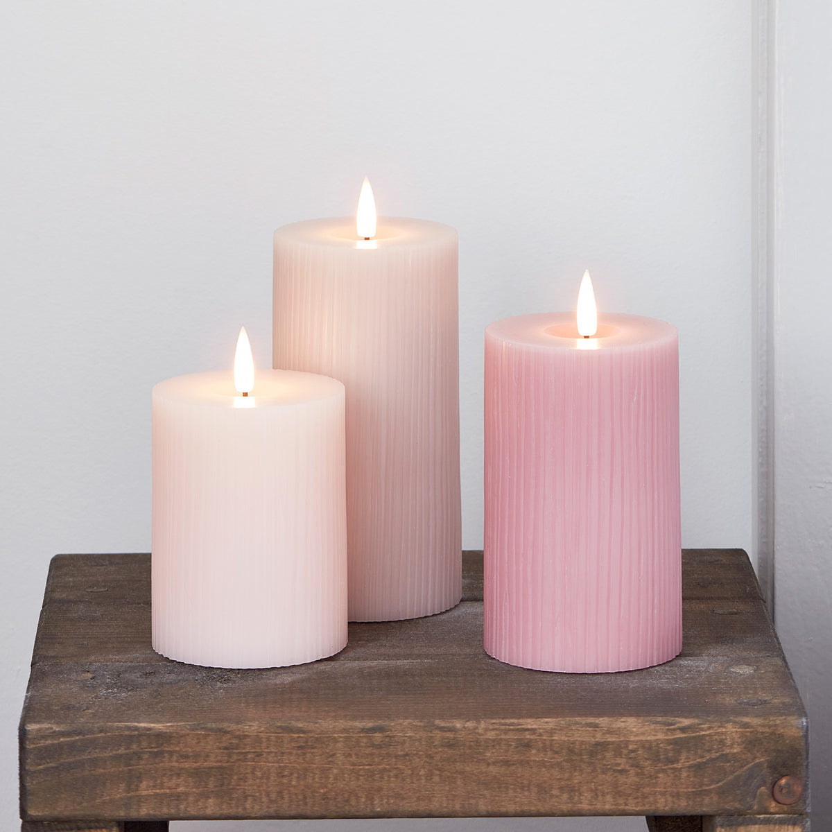 TruGlow® LED Kerzen Echtwach Trio geriffelt rosa