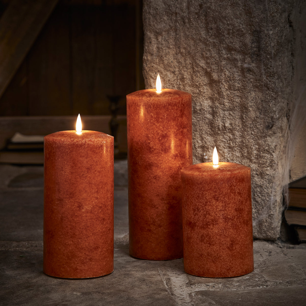 TruGlow® LED Kerzen Echtwachs Trio orange Ø 10cm mit Fernbedienung